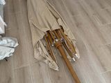 a umbrella that is laying on the floor in the room