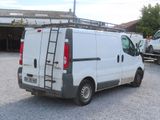 a white van that is parked in a parking lot