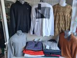 a lot of clothes on display in a store