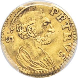a gold coin with an image of a man on it