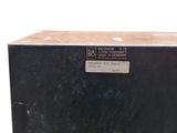 a black box that is sitting on a white surface