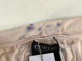 an image of a close up of a person ' s pants with a tag on it