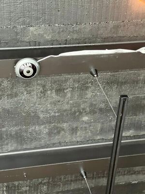 a close up of a metal door handle on a wall