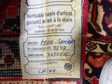 a label on the back of a bag with a picture on it