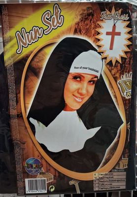 a cardboard picture of a nun with a cross on it