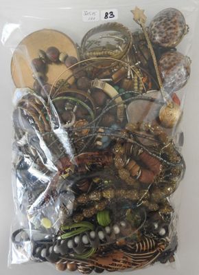 a bag full of assorted jewelry on a table