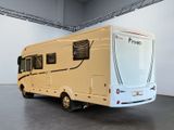 an image of a motorhome parked in a garage