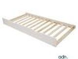 the bed frame is made of wood and has a slatt