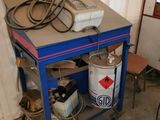 a blue table with a lot of tools on it
