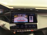 the dashboard of a car with a camera mounted to it ' s dashboard
