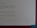 a letter written in french on a piece of paper