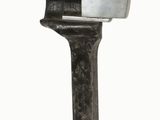 une photo d'une sculpture métallique représentant un porte-couteaux