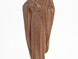 the statue of a woman holding a child is shown against a white background