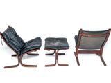 two chairs and a foot stool on a white surface