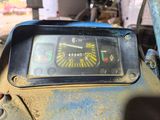 a close up of a speedometer on the dashboard of a motorcycle