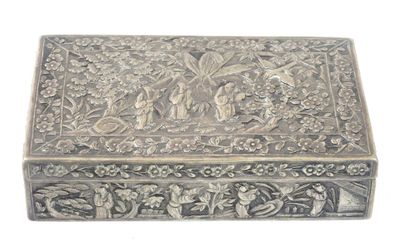 a silver box that is sitting on a white surface