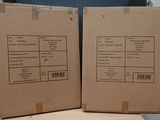 two boxes that are sitting on top of a table