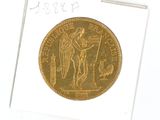 une image représentant une pièce d'or sur laquelle figure le portrait d'un homme