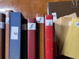 a lot of books that are on a table