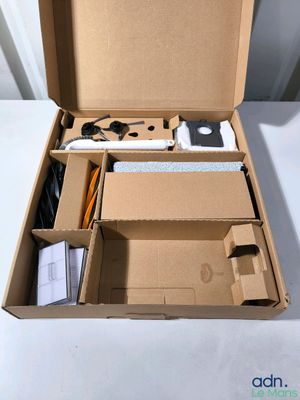 a cardboard box with a bunch of items inside of it