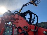 an image of a red machine with a crane on it