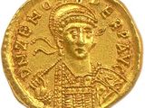 une pièce d'or portant l'image d'un homme