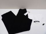 two pairs of black and white leggings on a white table