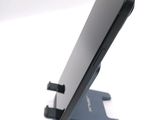 a close up of a cell phone on a stand