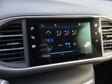 the dashboard of a car with a digital display in the center