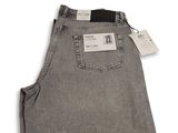 the back of a pair of grey jeans with a tag on it