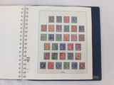 a book with stamps on it on a table