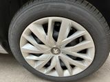 a close up of a tire on a car ' s rim