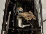 a truck that has a bunch of pipes in it