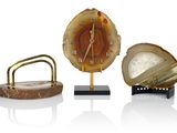 three different clocks that are sitting on top of each other