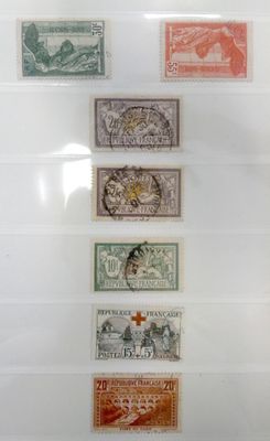 several different types of stamps are displayed in a display case