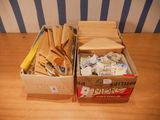 two boxes that have some kind of items inside of them