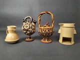 plusieurs types de vases et de bols posés sur une surface grise