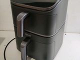 an image of a toaster with a cord attached to it