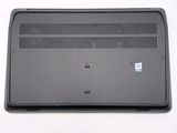 the back of a laptop with the bottom panel missing