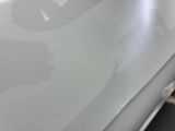 a close up of a laptop computer with a sticker on it