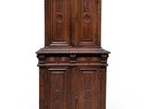 an old wooden cabinet with two doors and two drawers