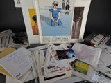 a lot of books and pictures on the table