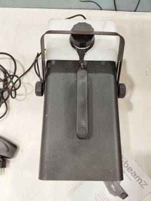a black and white photo of a laptop and a mouse