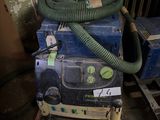 a blue box with a green hose and a blue box with a green hose