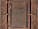 an old wooden picture frame with a green string hanging from it