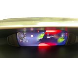 a digital display on the dashboard of a car