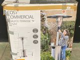 a box that has a picture of a woman standing next to a gas heater