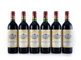 six bottles of wine lined up in a row on a white surface