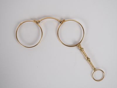 Binocles dépliantes en or jaune 750. - Photo 1