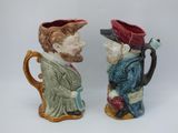 pair of ceramic figurines of a man and a woman